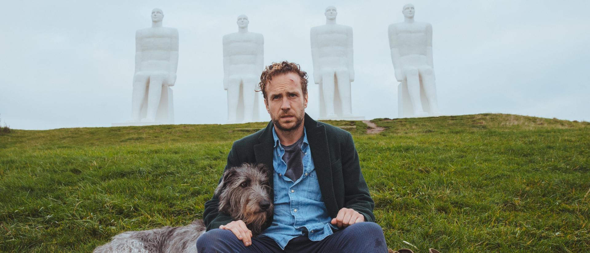 Rafe Spall and his dog in Denmark