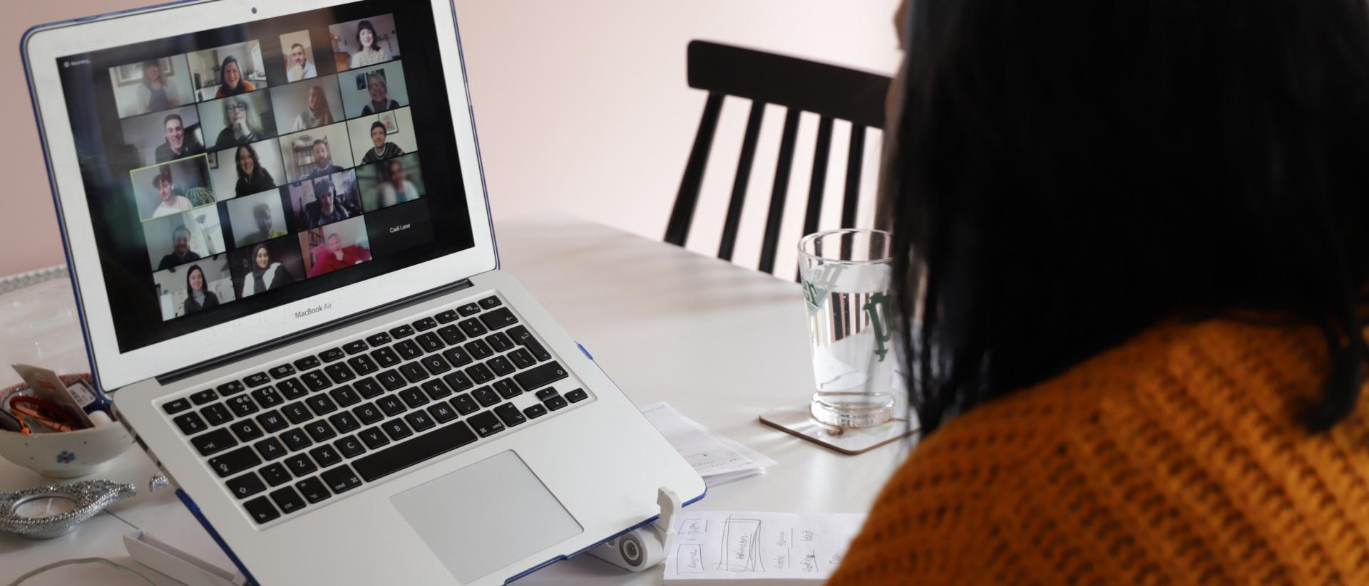 a person participating in an online meeting