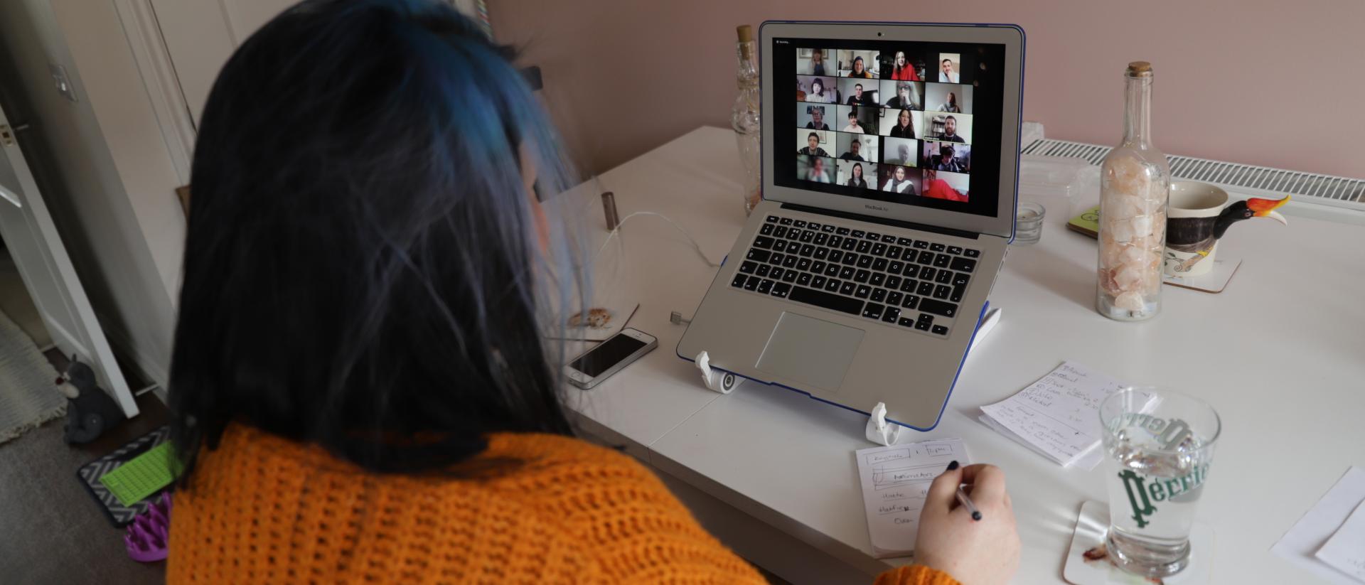 a photo of a person participating in an online meeting