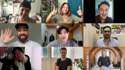 nine filmmakers shortlisted for the iris prize 2020 on an online meeting. Some wave and give a thumbs up.