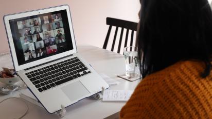 a person participating in an online meeting