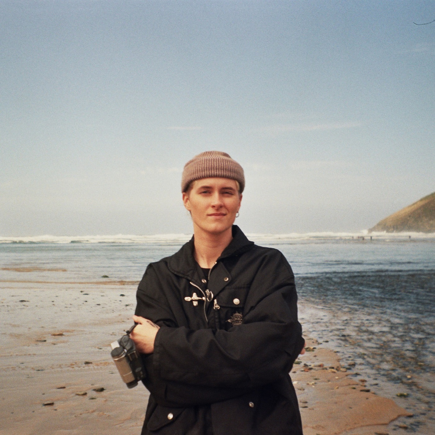 photo of ren faulkner standing on a beach