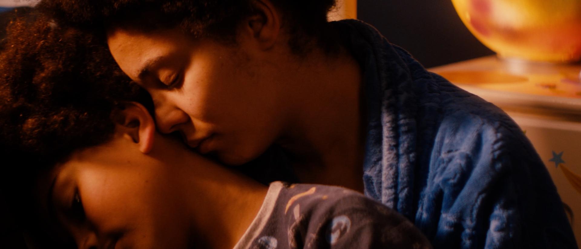 still from mothers day featuring a woman cuddling her child