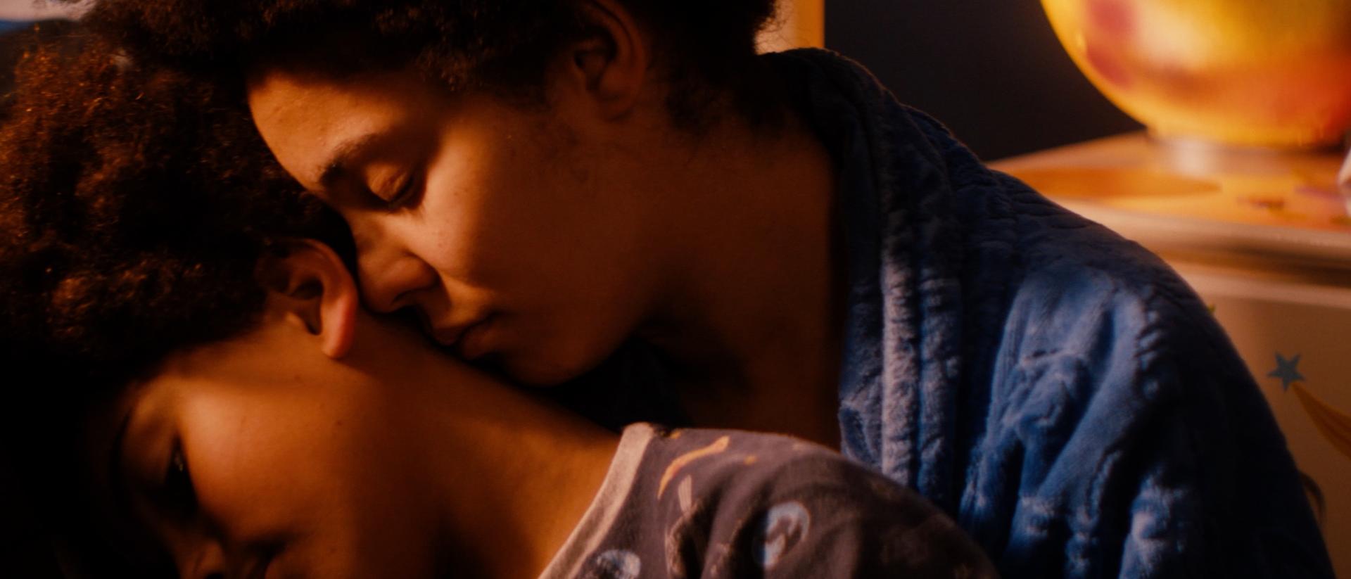 still from mothers day featuring a woman hugging a child