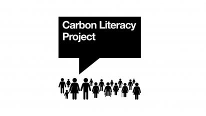 black graphics of people with a speech box that says Carbon Literacy Project