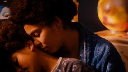 still from mothers day featuring a woman hugging a child
