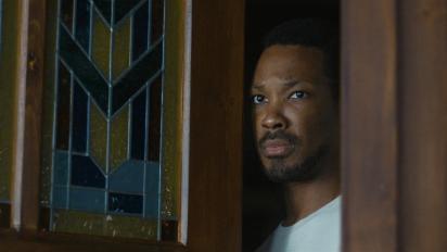 still from the man in my basement featuring a man answering his front door